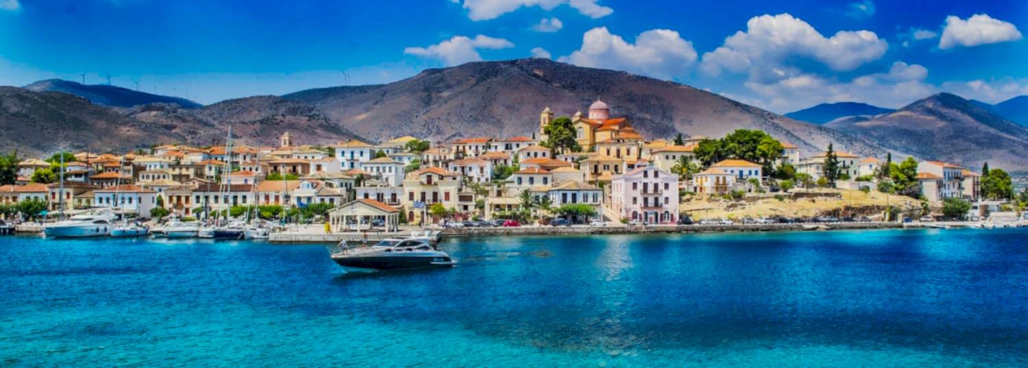 turquoise waters surrounding a quiet island in greece