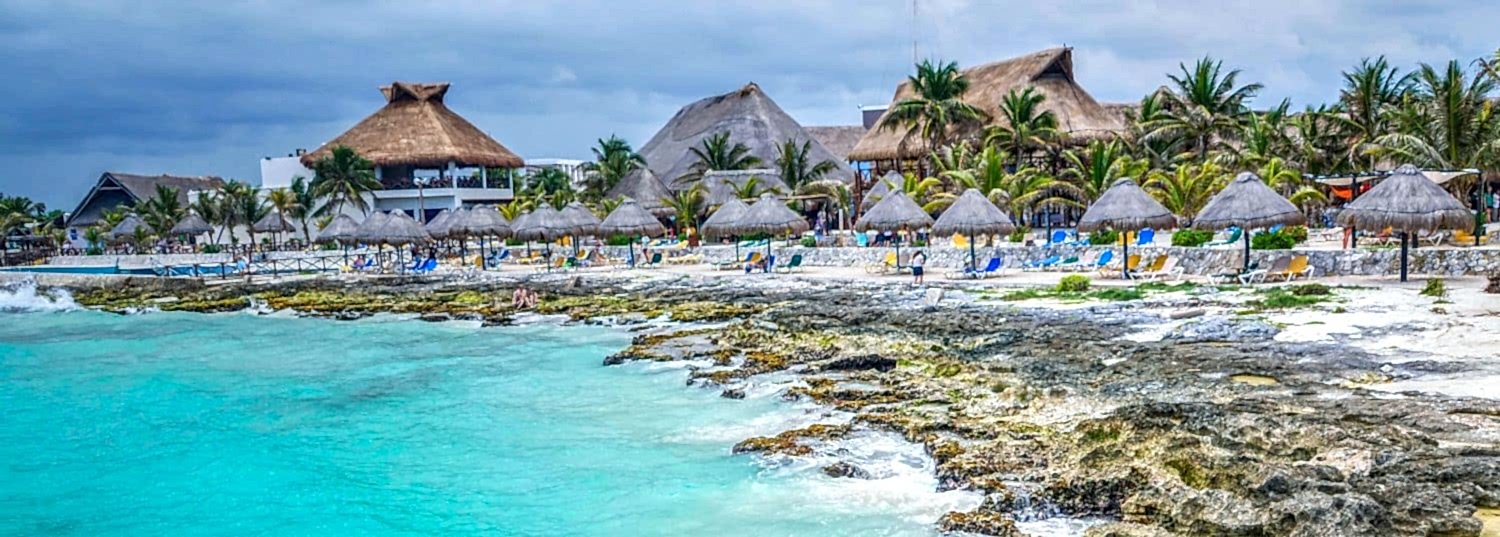 beautiful beach resort surrounded by a rocky beach and turquoise waters in mexico